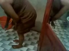 A lustful Indian man records his playgirl on camera naked because he can't live without her.